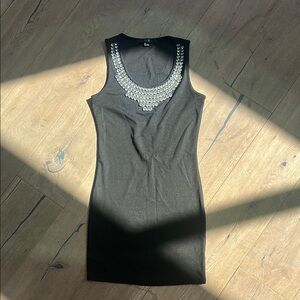 Black Sleeveless Dress with Silver Embellishments
